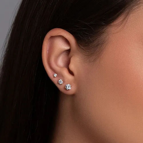 Прокол мочек ушей